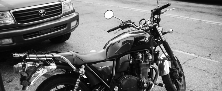 Black motorcycle parked on a street