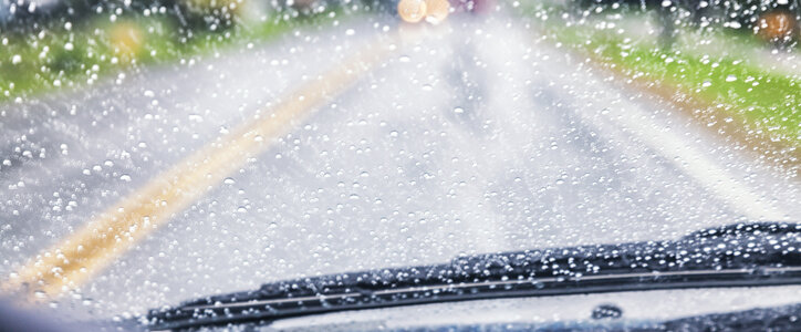 POV of a car driving through the rain